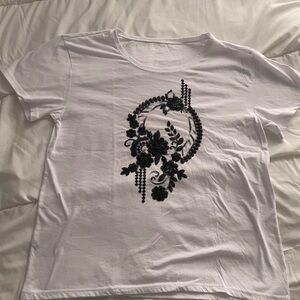 White T-Shirt with Black Floral Design